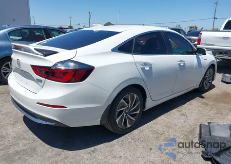 2020 Honda Insight Touring z USA, uszkodzony, nr VIN 19XZE4F9XLE003747